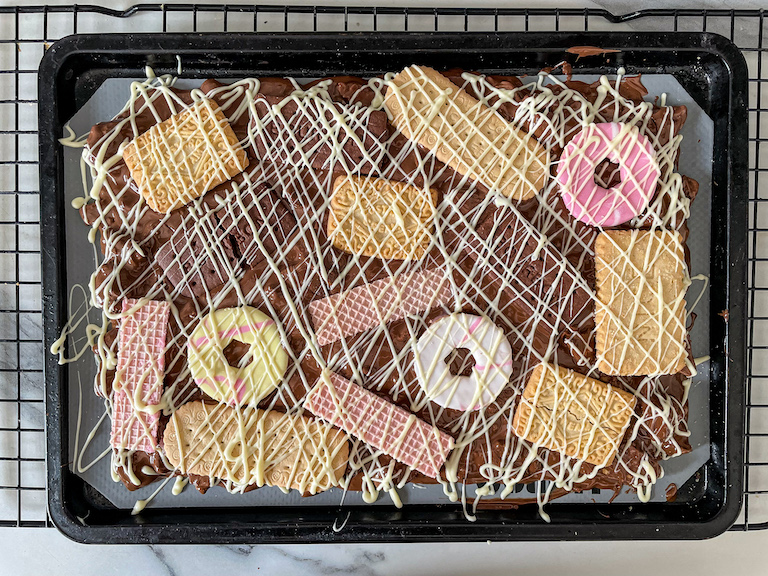 Biscuit bark with white chocolate drizzled over top