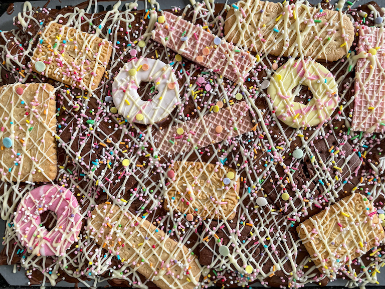 Chocolate bark decorated with biscuits and nonpareils