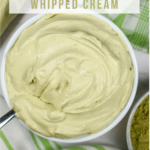 Looking down at a bowl of homemade matcha whipped cream