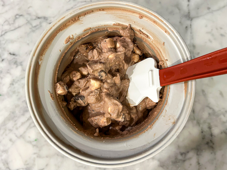 Ice cream in an ice cream maker with a spatula