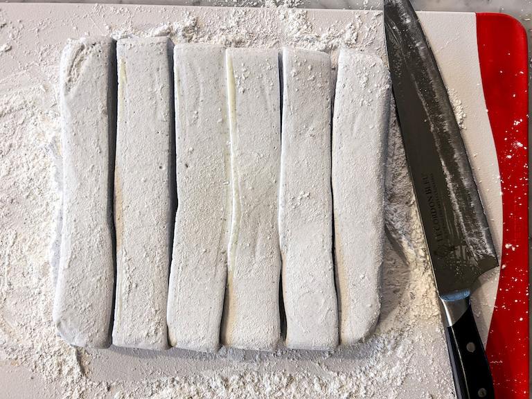 Slicing marshmallows with a sharp chef's knife