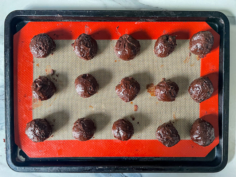 Balls of chocolate ganache on a small tray