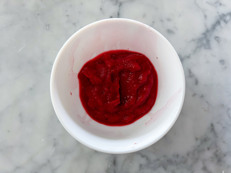 A small bowl of pureed beets