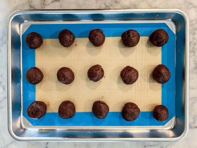 Chocolate truffles arranged on a tray