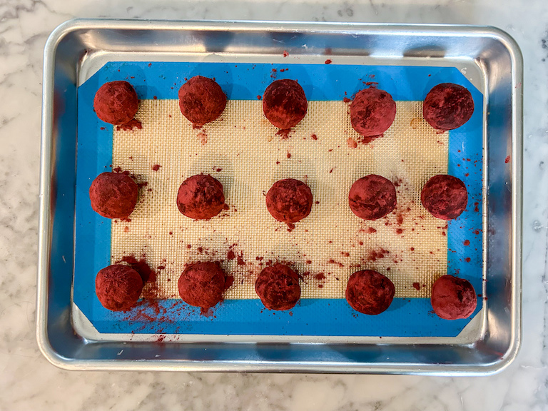 Beetroot truffles arranged on a tray