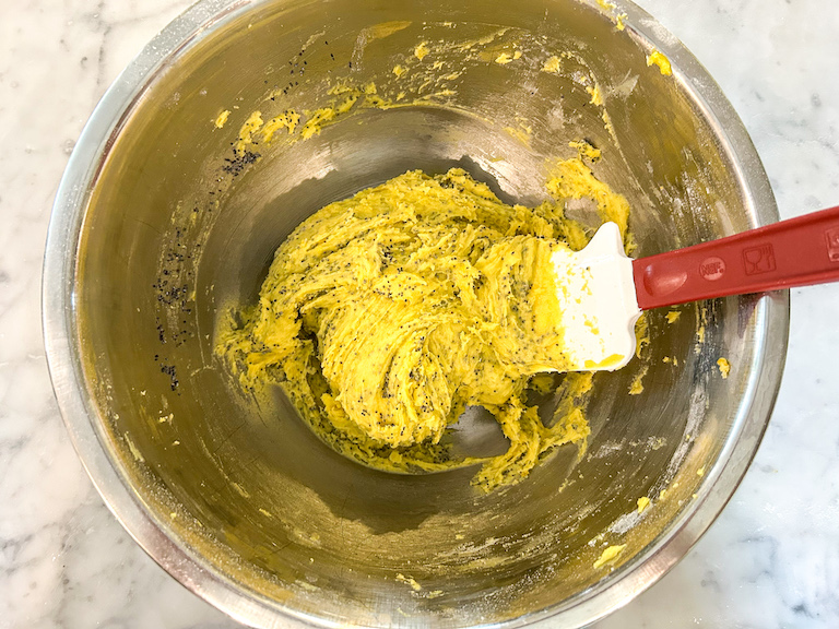 Whoopie pie batter in a mixing bowl with a spatula