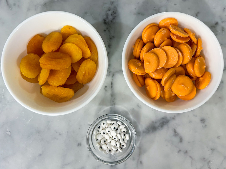 Ingredients for making a chocolate goldfish recipe with dried apricots