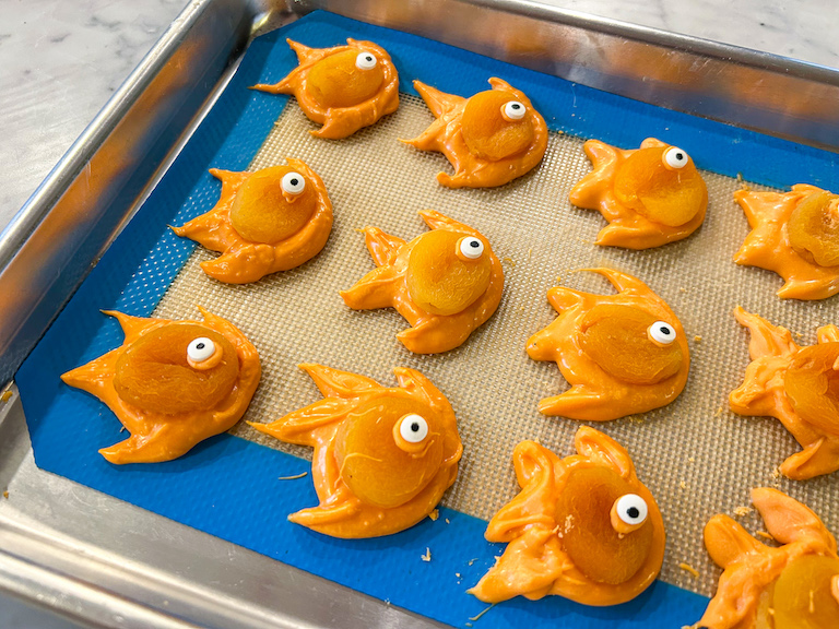 A tray of apricot chocolate goldfish