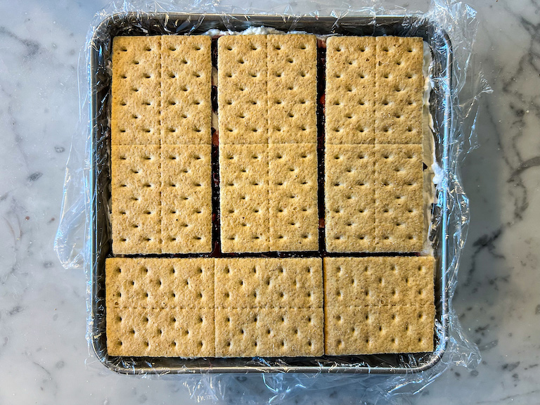 Graham crackers arranged in a metal tin