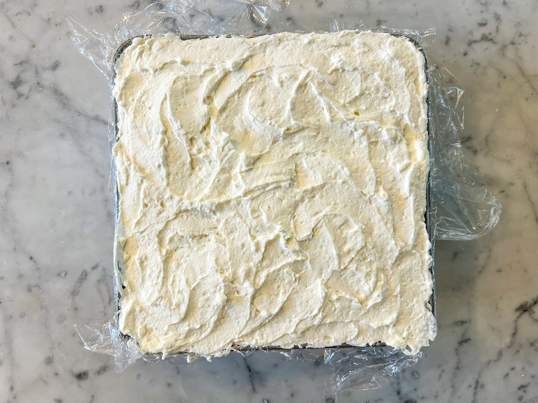 Icebox cake with cream cheese filling spread on top