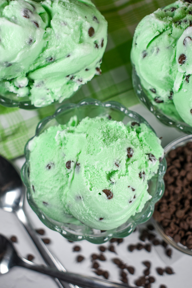 Looking down at three dishes of homemade mint chip ice cream