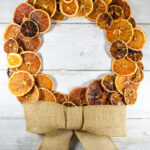 a wreath made of slices of dried citrus fruit