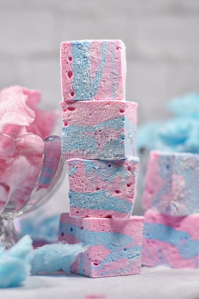 A stack of four pink and blue marshmallows