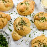 Garlic knots on a white surface