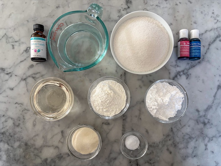 Cotton candy marshmallow ingredients on a marble surface