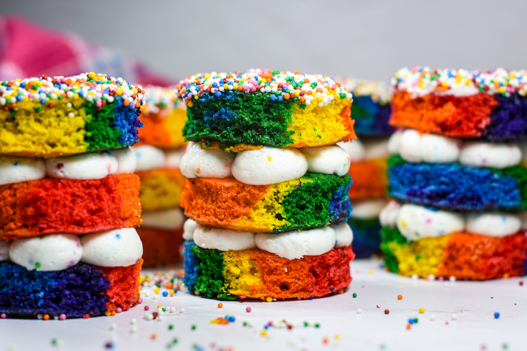 A row of rainbow dot cakes