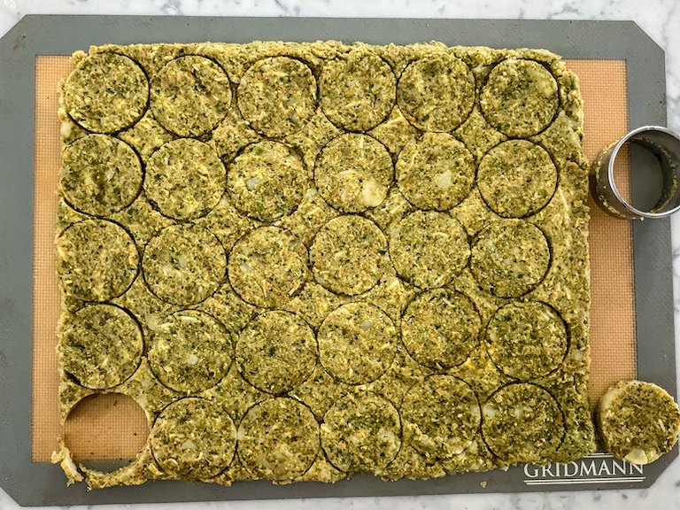 cutting frozen vegetable mixture with a round metal cutter