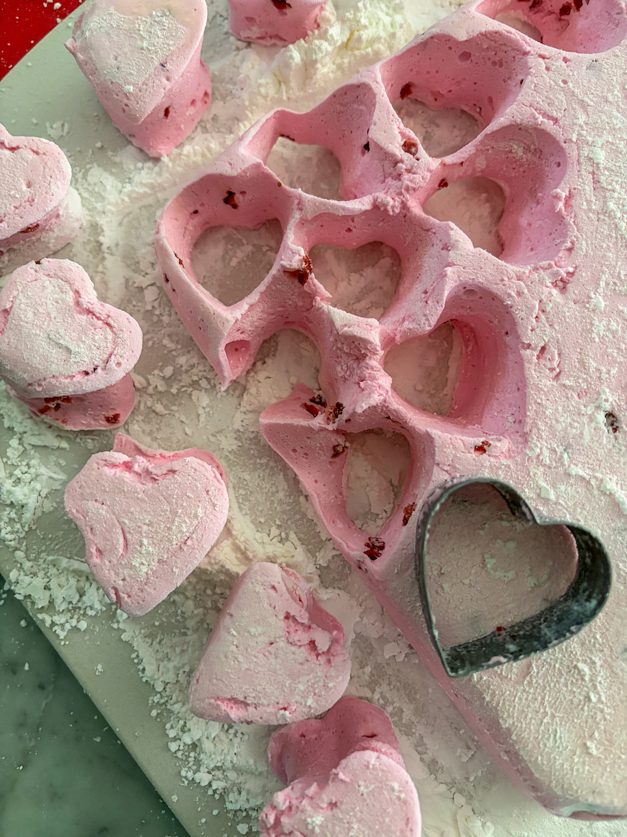 cutting marshmallows into heart shapes