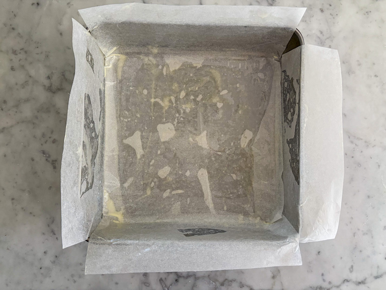 a square tin lined with parchment