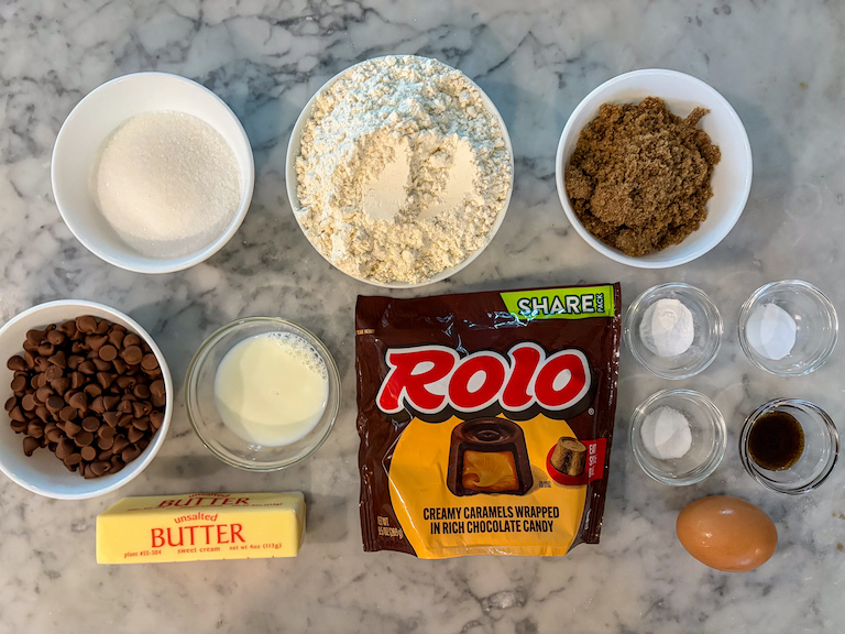 Rolo cookie recipe ingredients on a marble surface