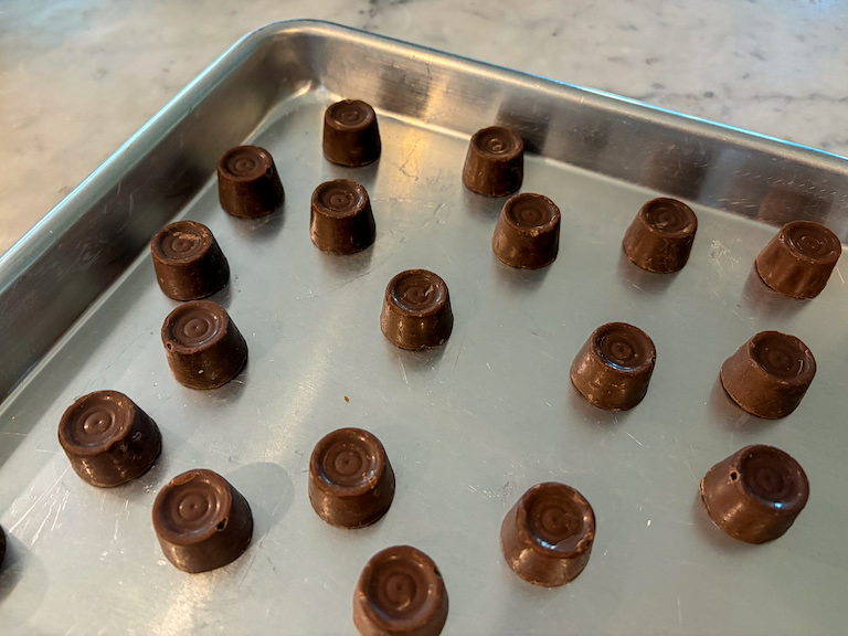 Rolos arranged on a metal tray