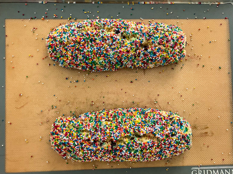 Rainbow biscotti logs on a silicone mat