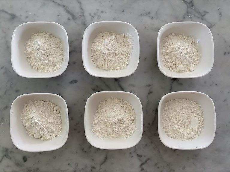 Six bowls of flour