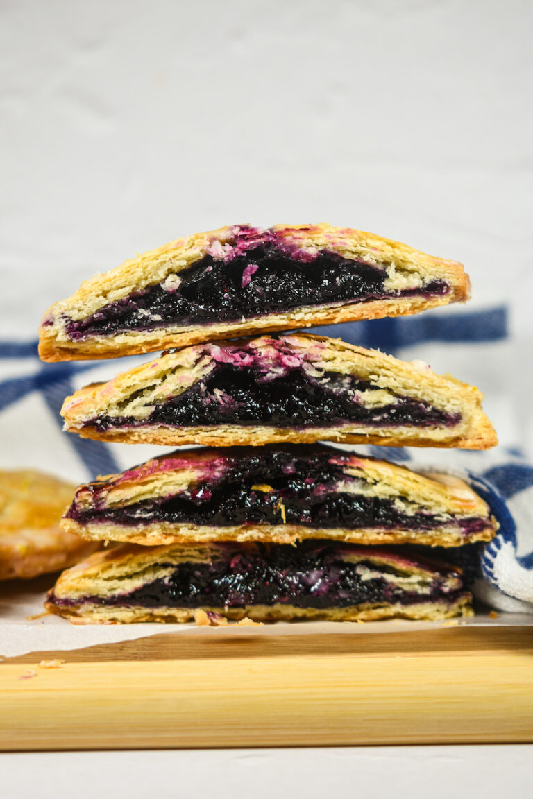 Stack of hand pies filled with blueberry jam