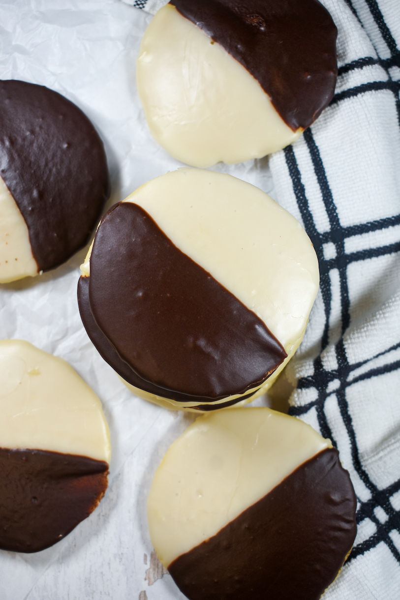 nyc-style black and white cookies on a white surface