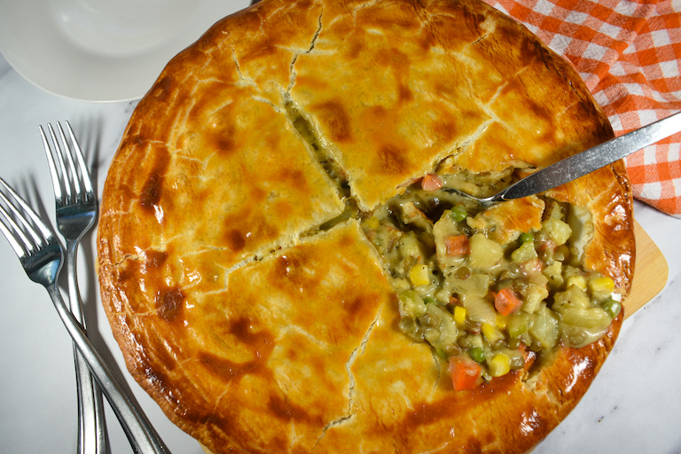 veggie pot pie with a spoon
