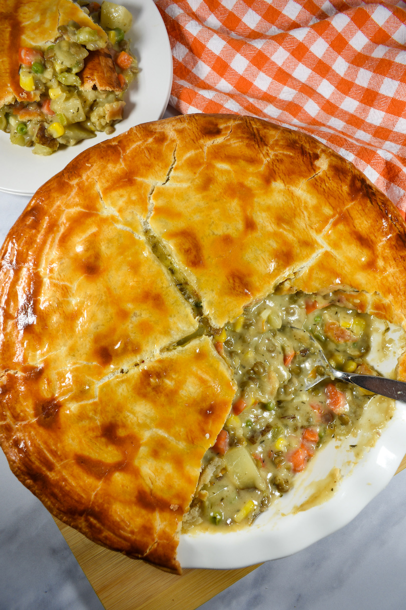 a meatless lentil pot pie with a golden brown crust