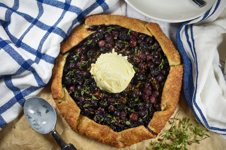 blueberry galette with vanilla ice cream on top