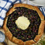 blueberry galette with a scoop of ice cream on top