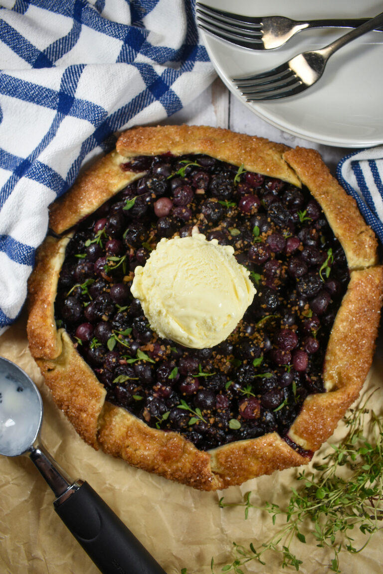 blueberry galette with a scoop of ice cream on top