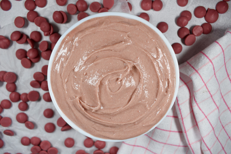 bowl of ruby ganache surrounded by ruby callets
