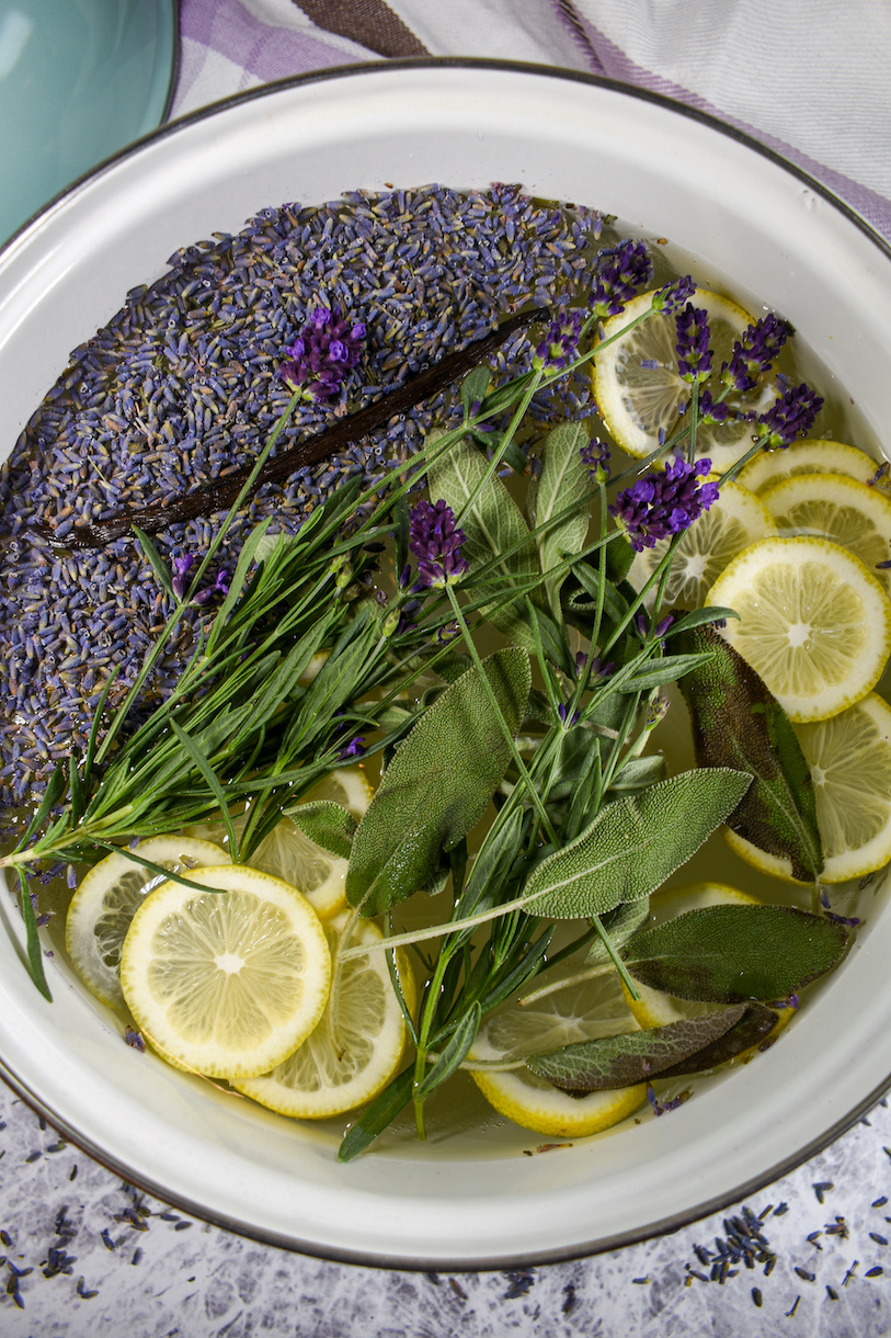 lavender simmer pot with sage, lemon slices, and a whole vanilla bean