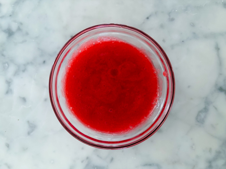 Raspberry puree in a bowl