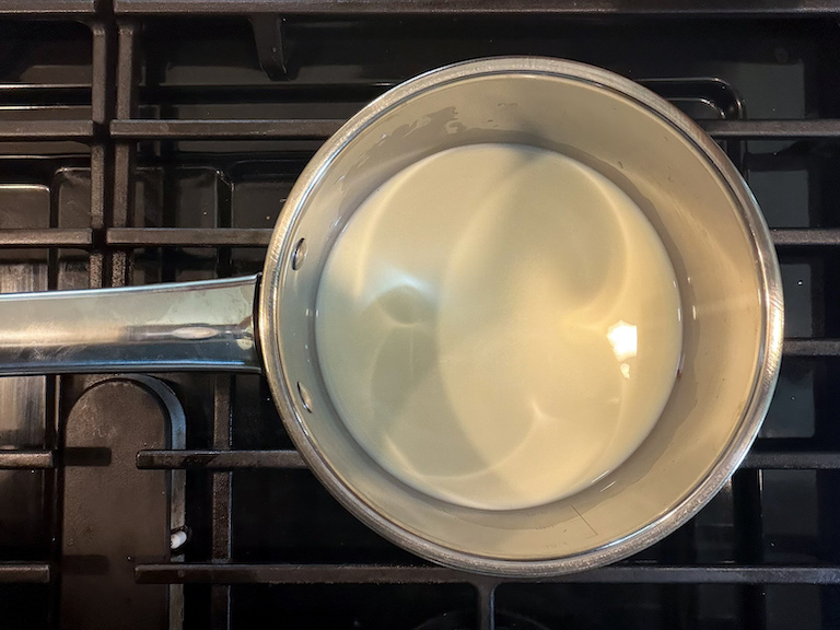 warming milk and sugar on the stovetop