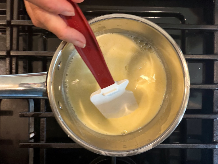 stirring pastry cream with a spatula