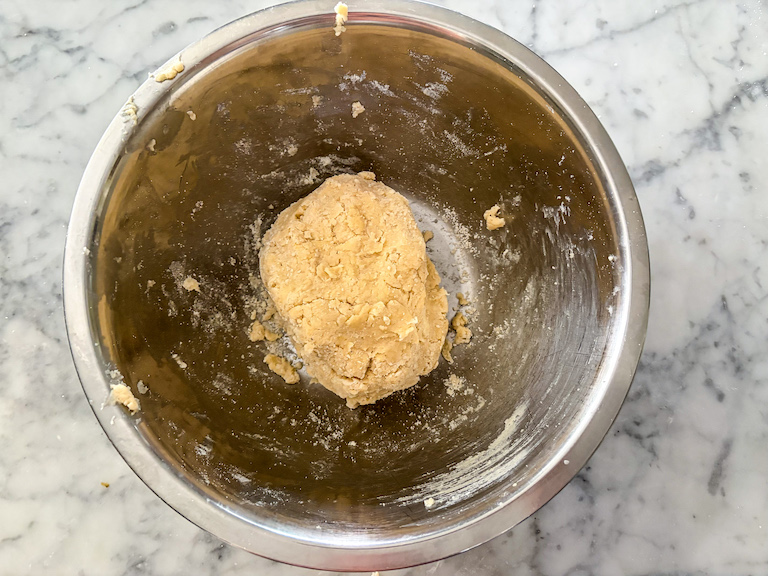 shortcrust pastry in a metal bowl
