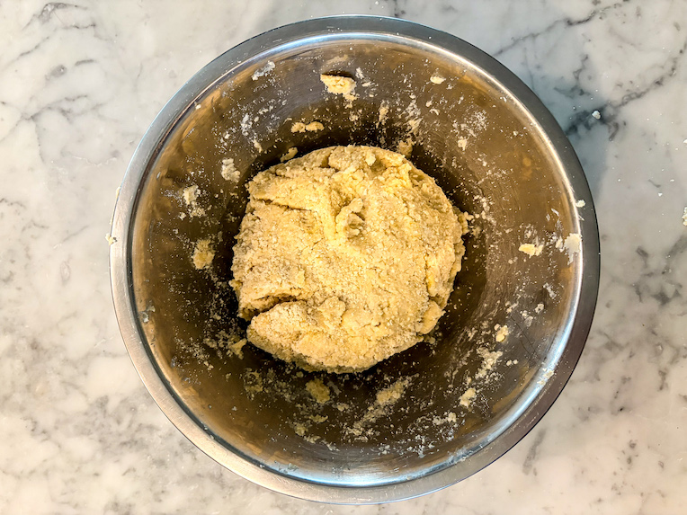 shortcrust pastry in a metal bowl