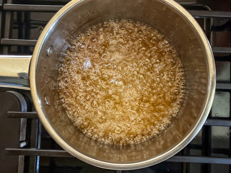 caramel cooking in a saucepan