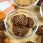 a bowl of pumpkin spice truffles with crunchy sugar coating