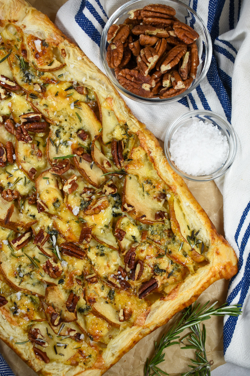 a puff pastry tart with pears, blue cheese, pecans, and sea salt