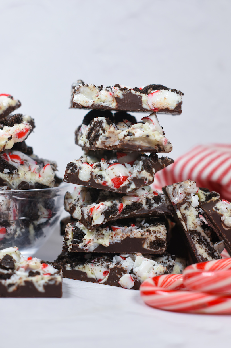 a stack of chocolate peppermint bark on a white surface