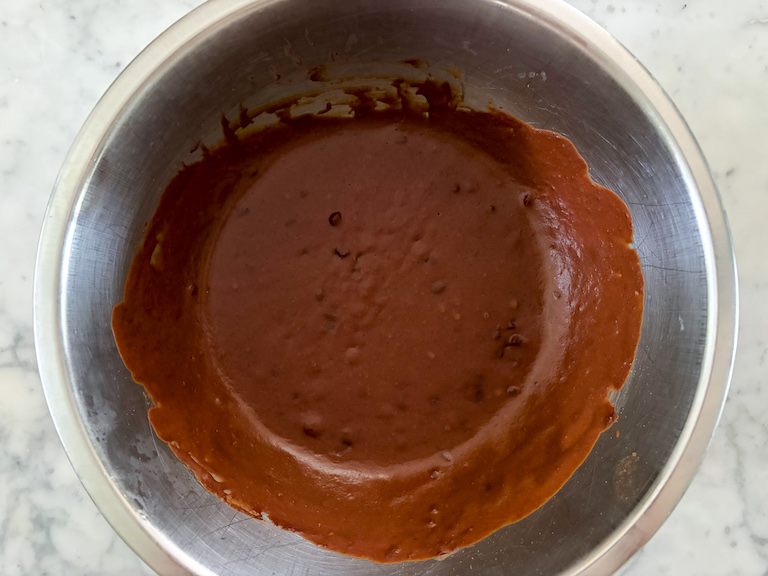 a bowl of chocolate pumpkin ganache