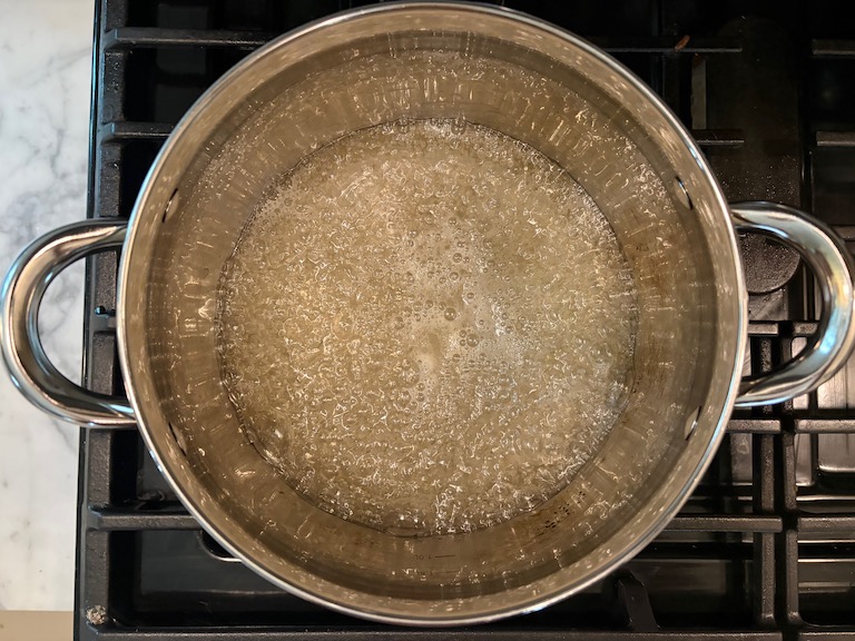 hot sugar syrup in a pan on the stovetop