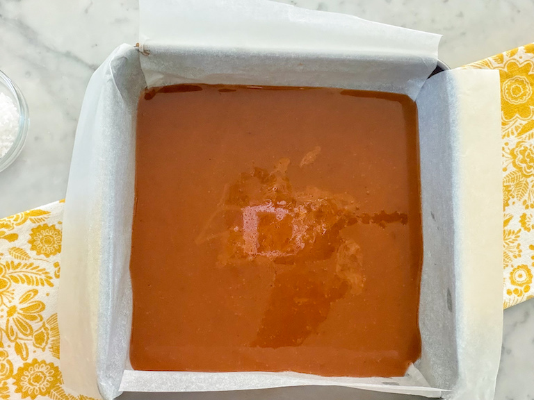 a square tin of caramels