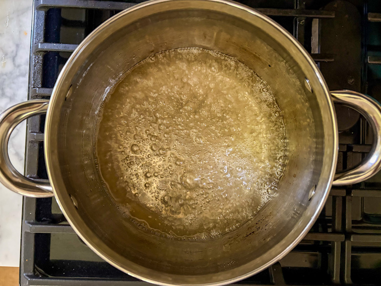 sugar syrup boiling in a pan