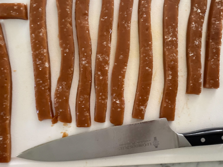 slicing caramels with a chef's knife